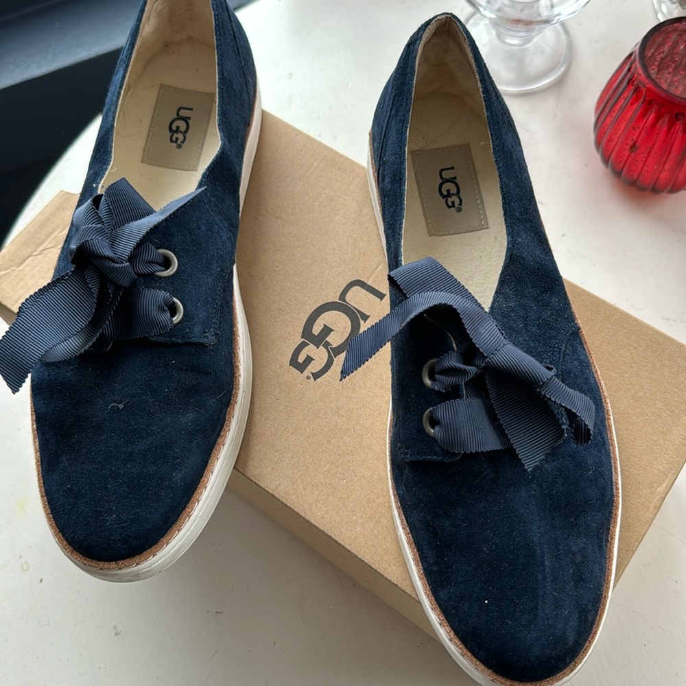 UGG 9.5 suede sneaker ribbon tie. Smoke free home. In almost perfect condition.